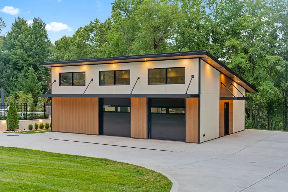 Accessory building with two-bay collector garage and guest quarters above