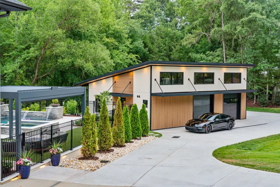 Gated garage court and oversized circular drive