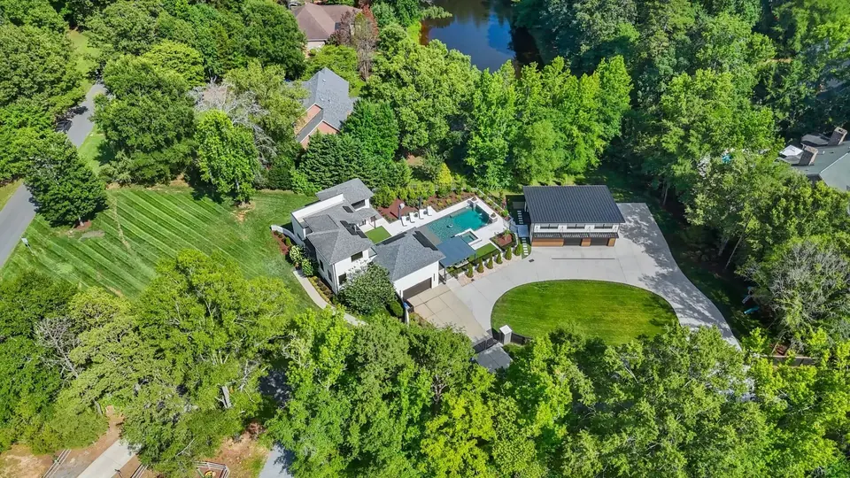 Aerial of the estate surrounded by mature trees